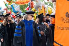Dean West and Chair Rosalyn Berne lead the procession