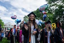 Students walk the Lawn