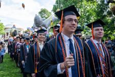 Students walk the Lawn