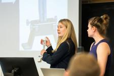 A student speaks during a capstone presentation