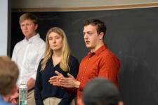 A student speaks during a capstone presentation