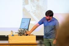 A student speaks during a capstone presentation