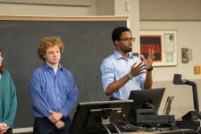 A student speaks during a capstone presentation