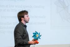 A student speaks during a capstone presentation