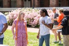 faculty and staff talk during the picnic