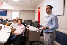 a graduate student speaks during the SIEDS conference