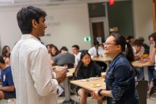 Faculty and students talk at the brunch