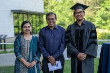 Faculty and students pose for a photo
