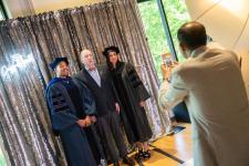 attendees pose for pictures