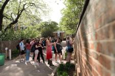 students wait to enter the garden party