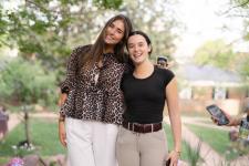 Two students pose