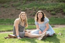 students seated on the grass