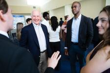 Students speak to faculty and attendees