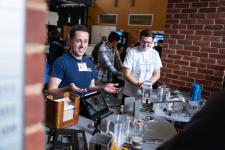 Materials science students speak to attendees