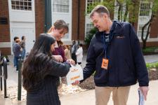 Prof. Brian Smith shares doughnuts on Engineer's Way