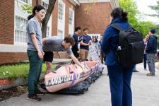 Concrete Canoe team members speak to attendees
