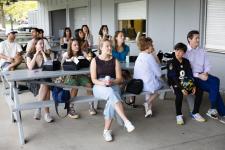 students seated at tables
