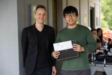 student award winner with Prof. Matthew Bolton