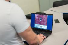 A student plays a video game