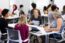 Student leaders discuss topics at an ECSI breakfast event
