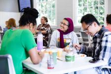 Student leaders discuss topics at an ECSI breakfast event