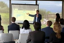 A man giving a slide presentation