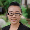 UVA Link Lab faculty member, Sarah Sun, is pictured here wearing glasses in an exterior headshot.