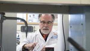 Portrait of George Christ at the lab bench