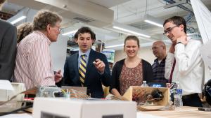 a student discusses a capstone project