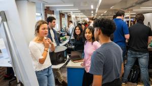 a student explains a capstone project
