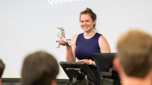 A student speaks during a capstone presentation