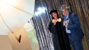 Attendees pose for photos